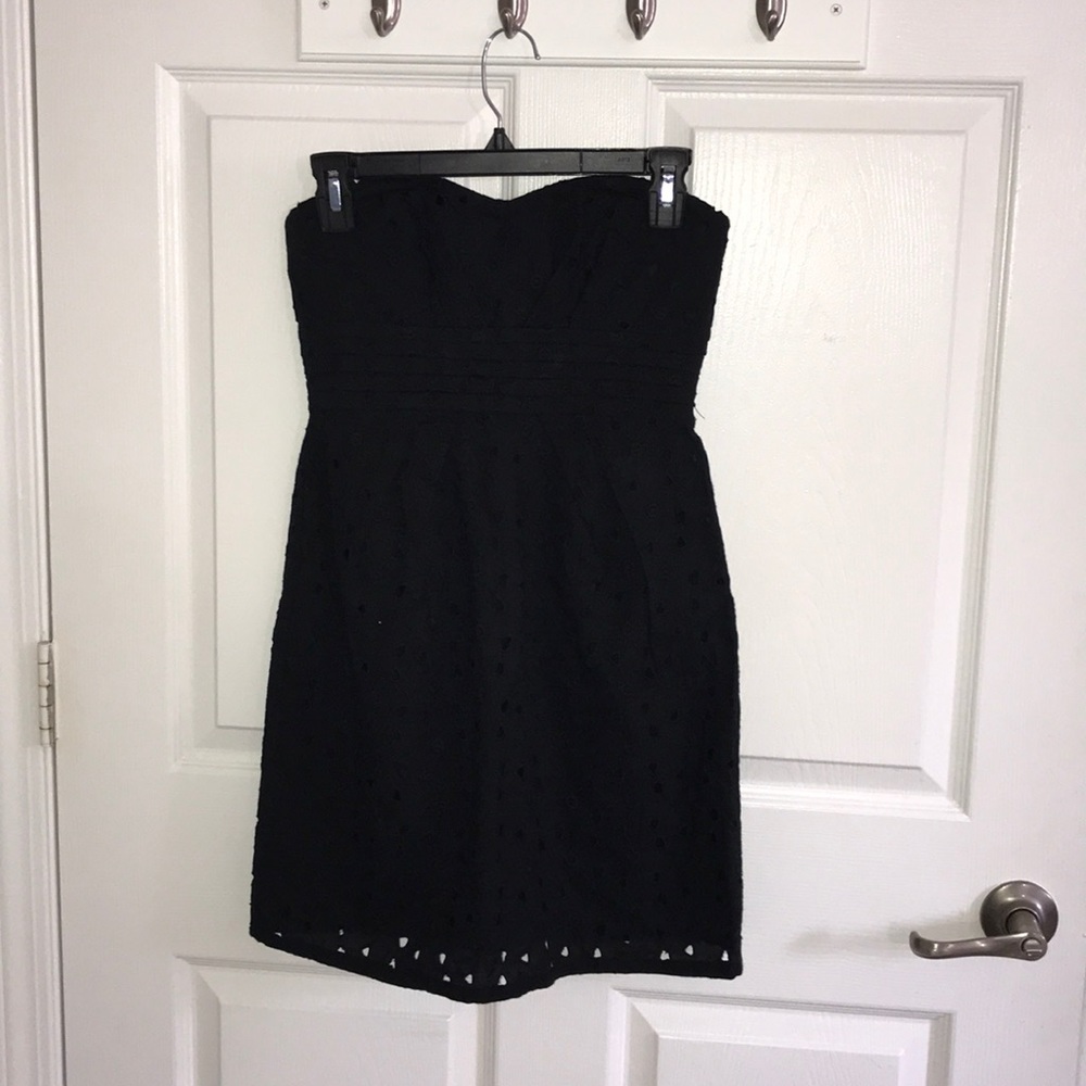 Strapless black dress.